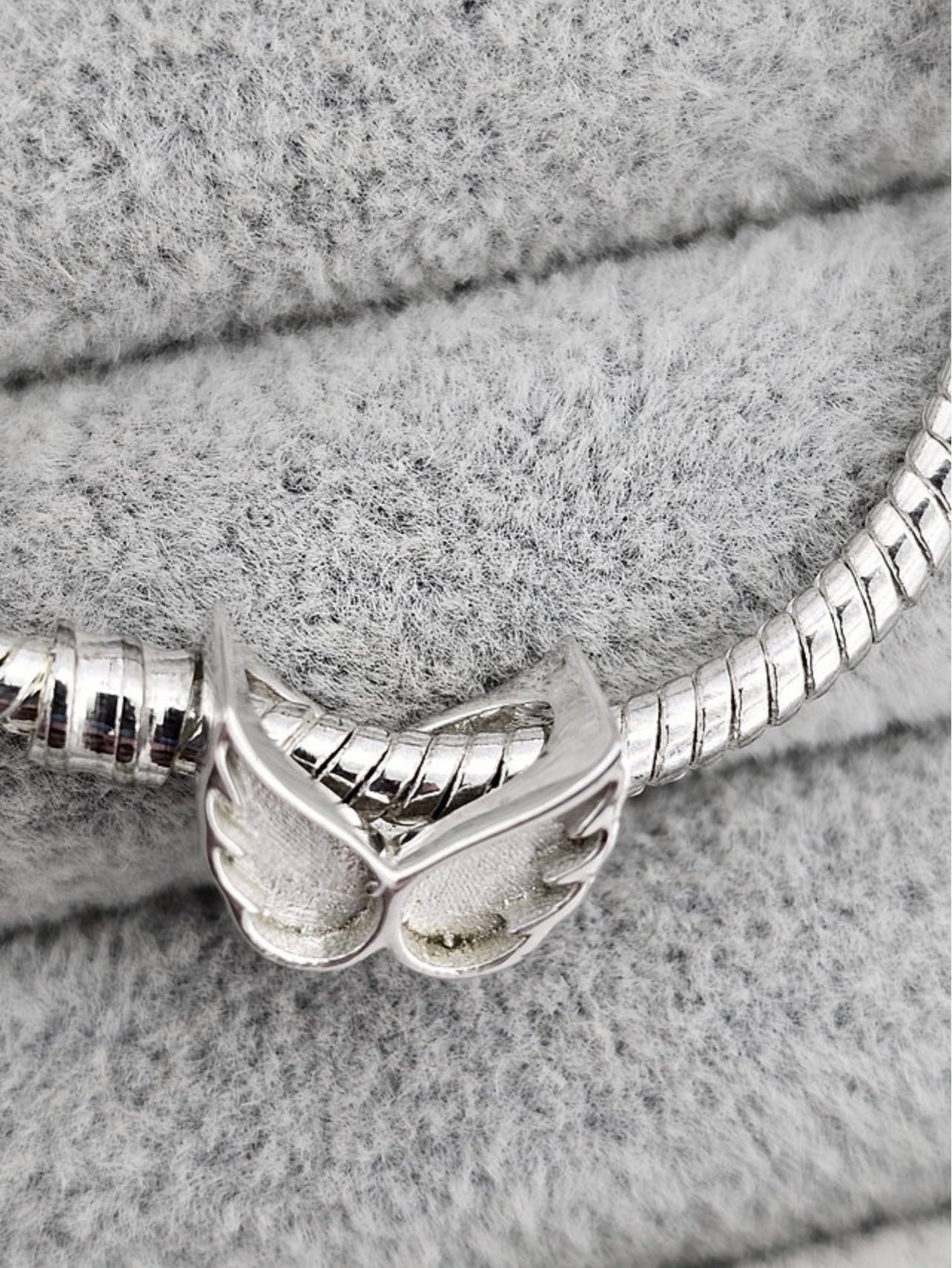 Angel wings charm