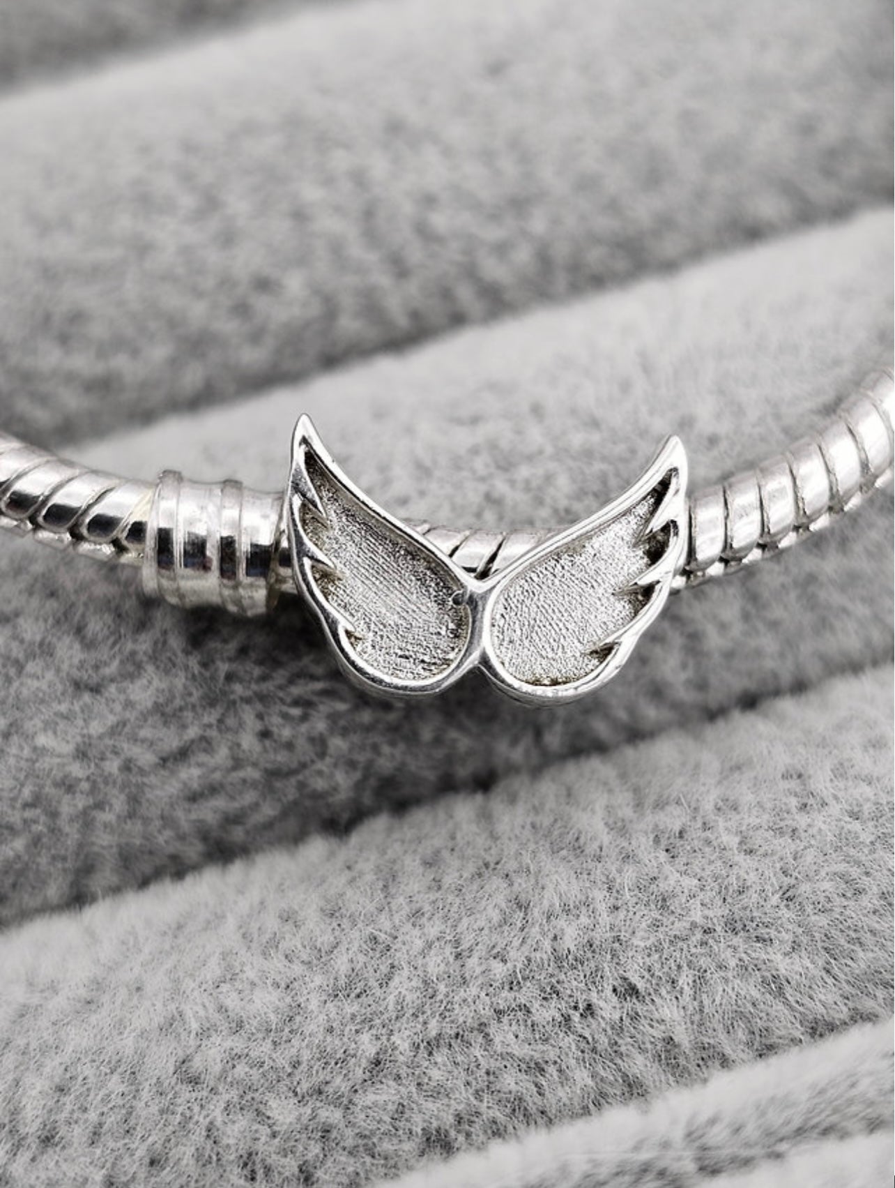 Angel wings charm