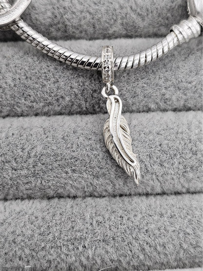 Feather dangle charm
