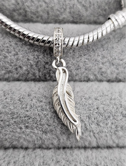 Feather dangle charm