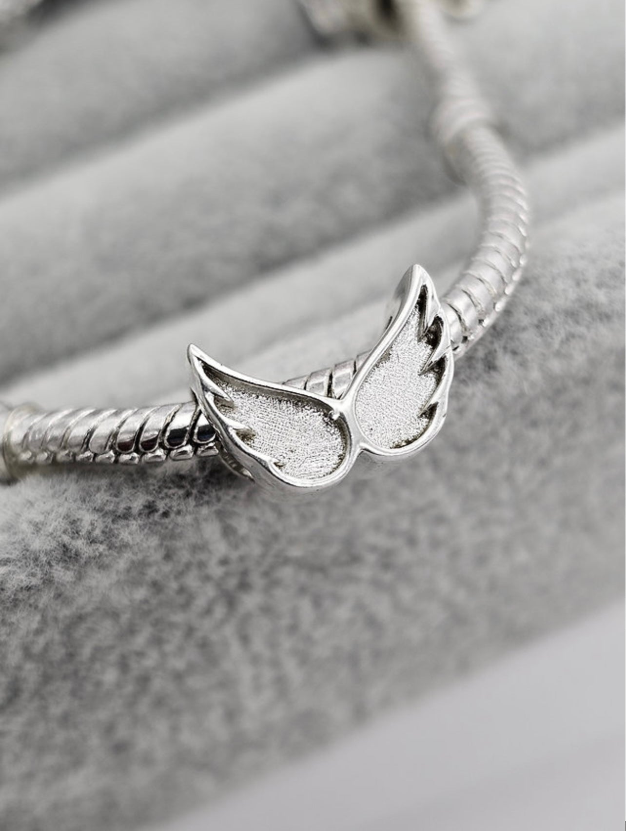 Angel wings charm