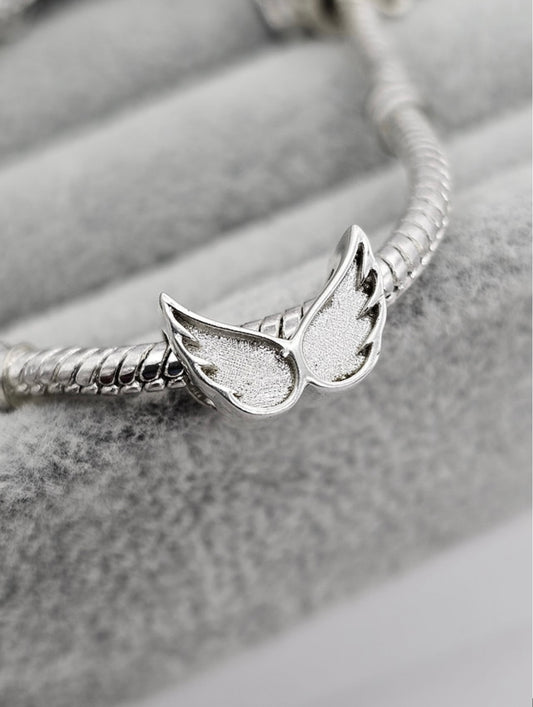 Angel wings charm