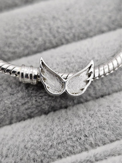 Angel wings charm